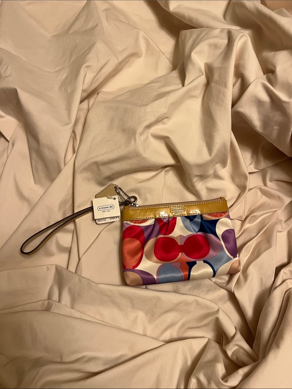 Coach Colorblock Signature Wristlet in Red, Pink, Purple, Blue & Tan